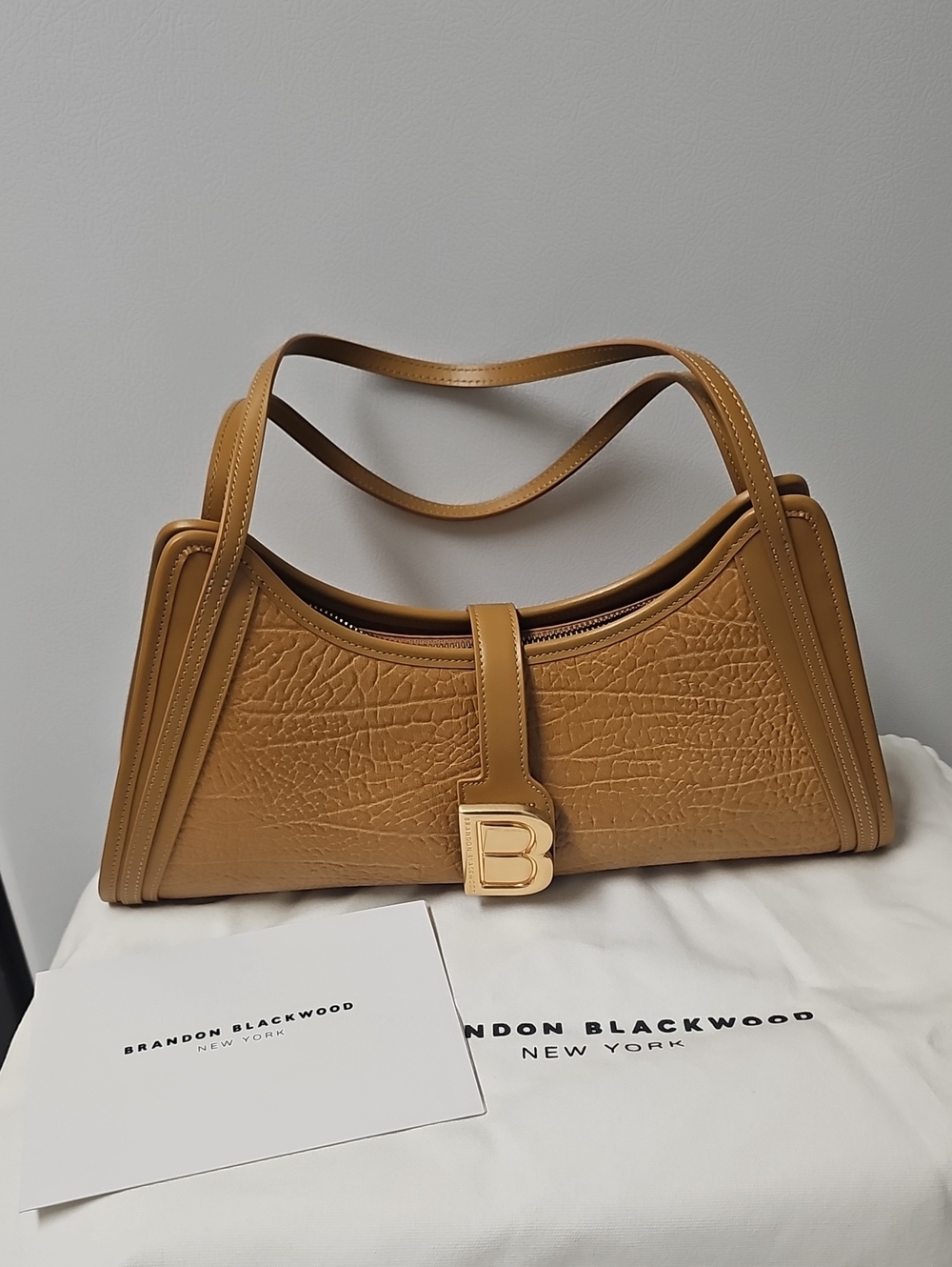 Brandon Blackwood Camel/Tan Textured Leather Shoulder Bag with Gold 'B' Accent .